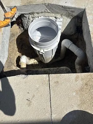 New white pool skimmer plumbed in the ground