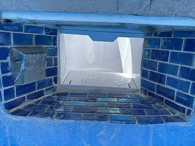 New skimmer throat in a tiled pool wall