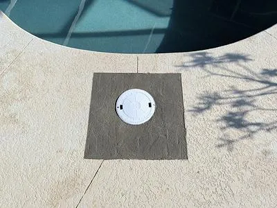 Concrete patch around a new skimmer lid