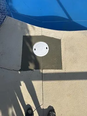 New concrete around a pool skimmer lid