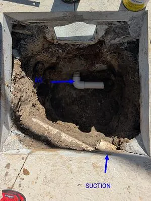 Old skimmer dug out with the suction and return lines marked