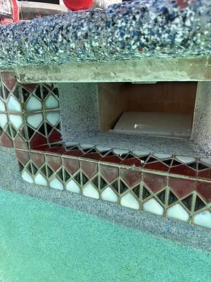 Finished skimmer throat with new plaster