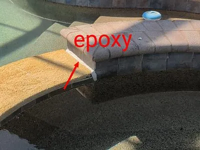 Spa spillover with old epoxy marked