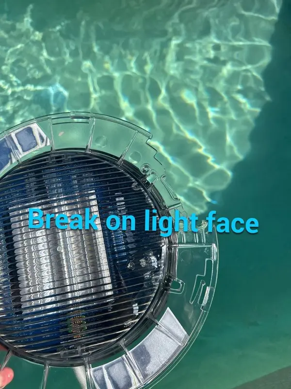 Pool light with a broken face plate