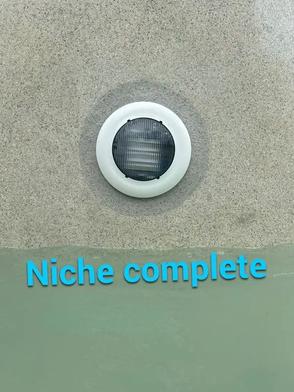 Finished pool light in a new niche