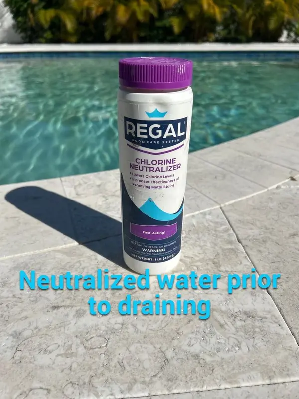 Bottle of chlorine neutralizer on the pool deck