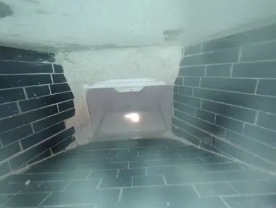 Inside view of a new skimmer throat at the pool wall