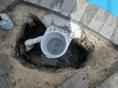 New pool skimmer plumbed into the line below the deck
