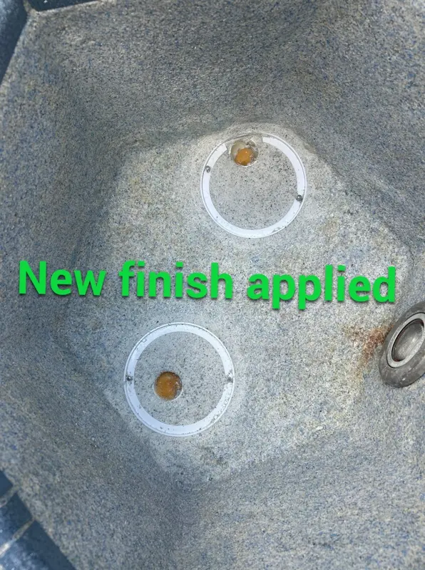 New finish applied around two spa main drains