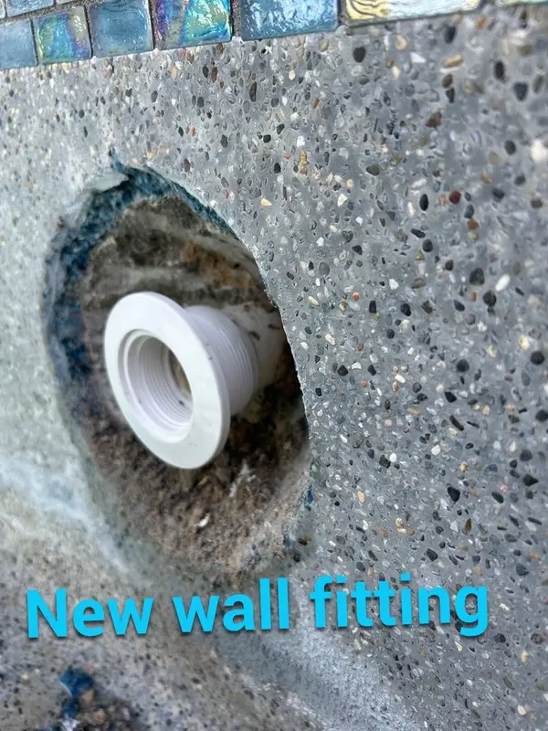 New return wall fitting installed in the pool wall