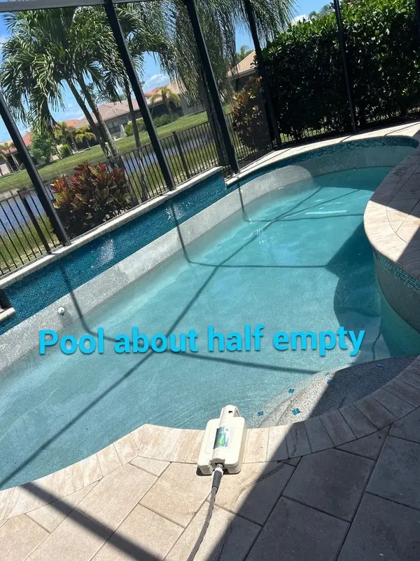 Pool drained about halfway for a return fitting repair