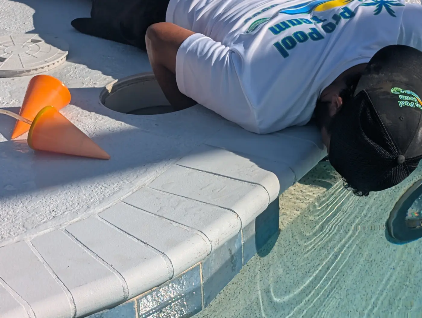 Leak tech dye testing a pool skimmer throat for a leak