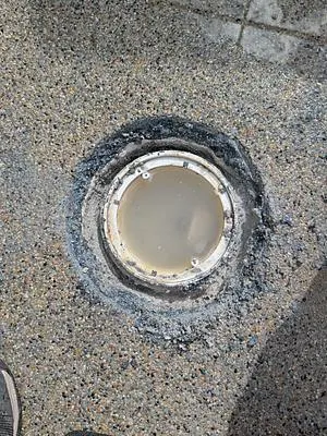 Main drain with the pool floor opened around it