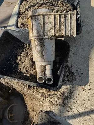 Old pool skimmer pulled out of the ground