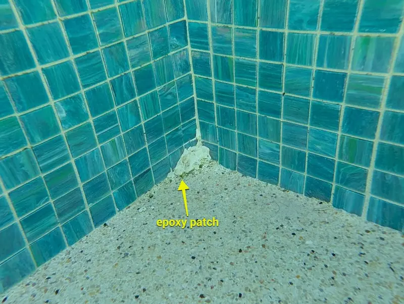 Epoxy patch in the corner of a spa bench
