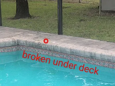 Paver pool deck with the broken return line location marked in North Fort Myers