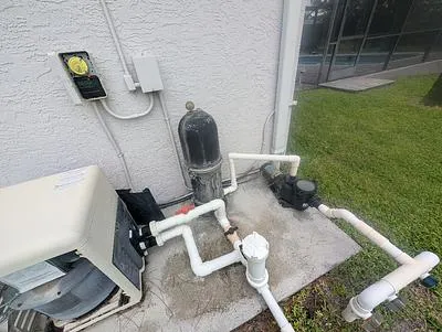 Pool pump, filter and heater on the equipment pad