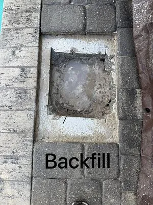 Hole backfilled between the pavers