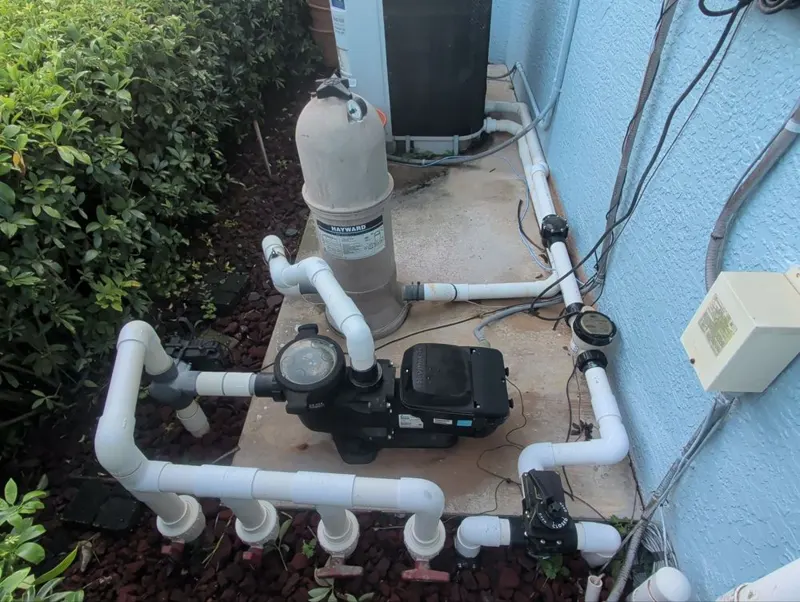 Pool pump, filter, salt cell and plumbing on the equipment pad