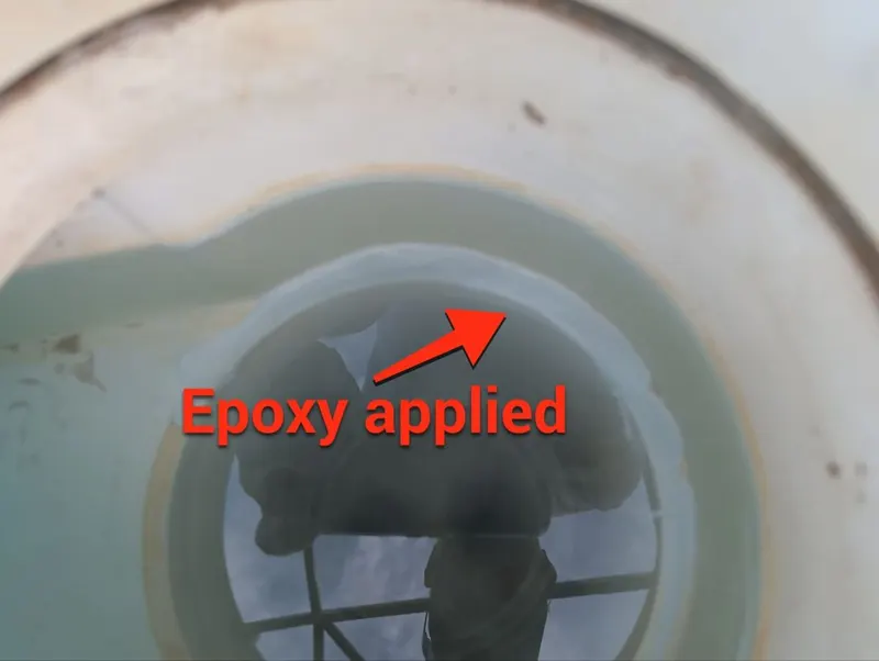 Temporary epoxy patch applied inside the skimmer