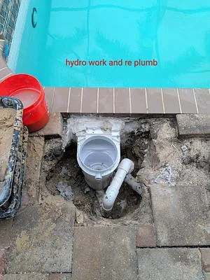 New skimmer plumbed and set in hydraulic cement