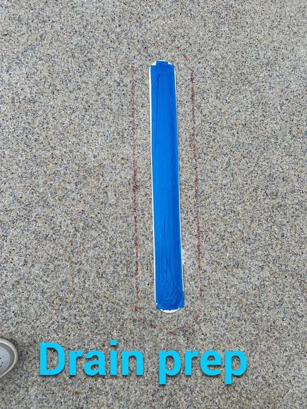 Long slot main drain taped off in a drained pool