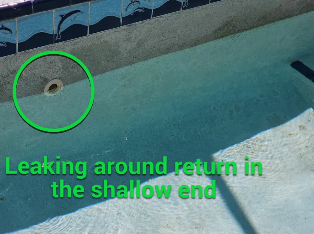 Return fitting in the shallow end circled as leaking