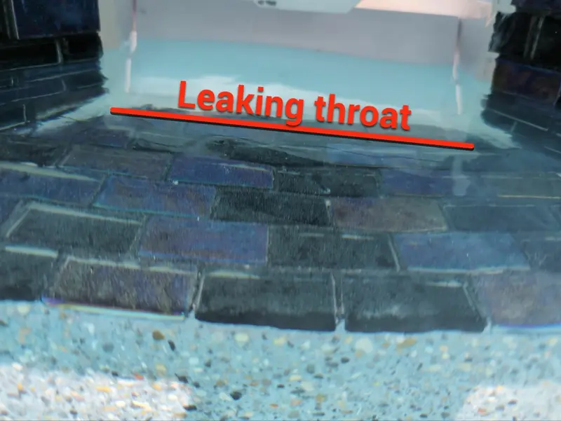 Second skimmer throat with a red line marking the leak