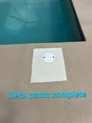 Patched pool deck around a new skimmer lid