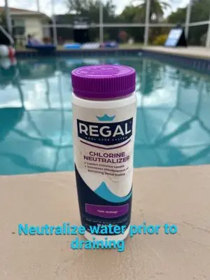 Bottle of chlorine neutralizer on the pool deck