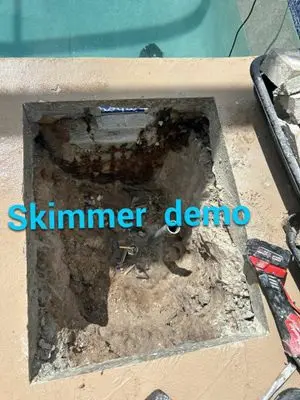 Old skimmer cut out of the pool deck