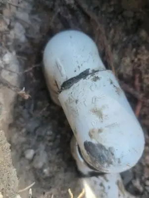 Spa plumbing fitting in the ground during the repair