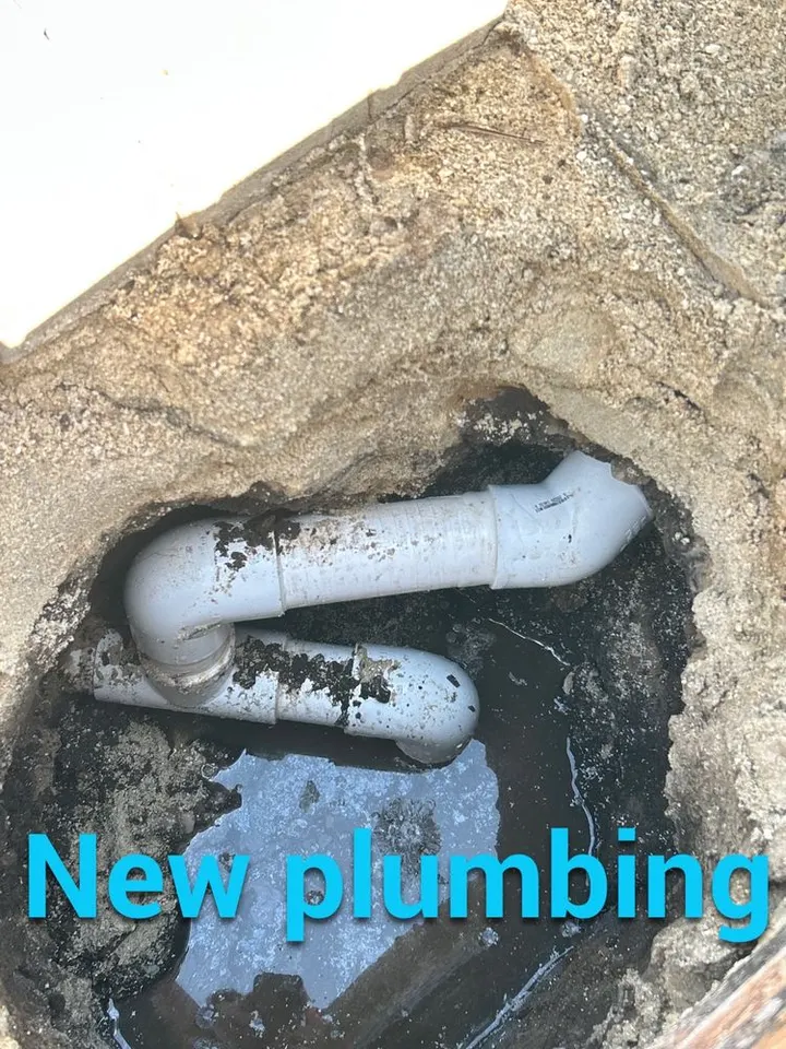 New return line plumbing installed under a pool deck in St. James City